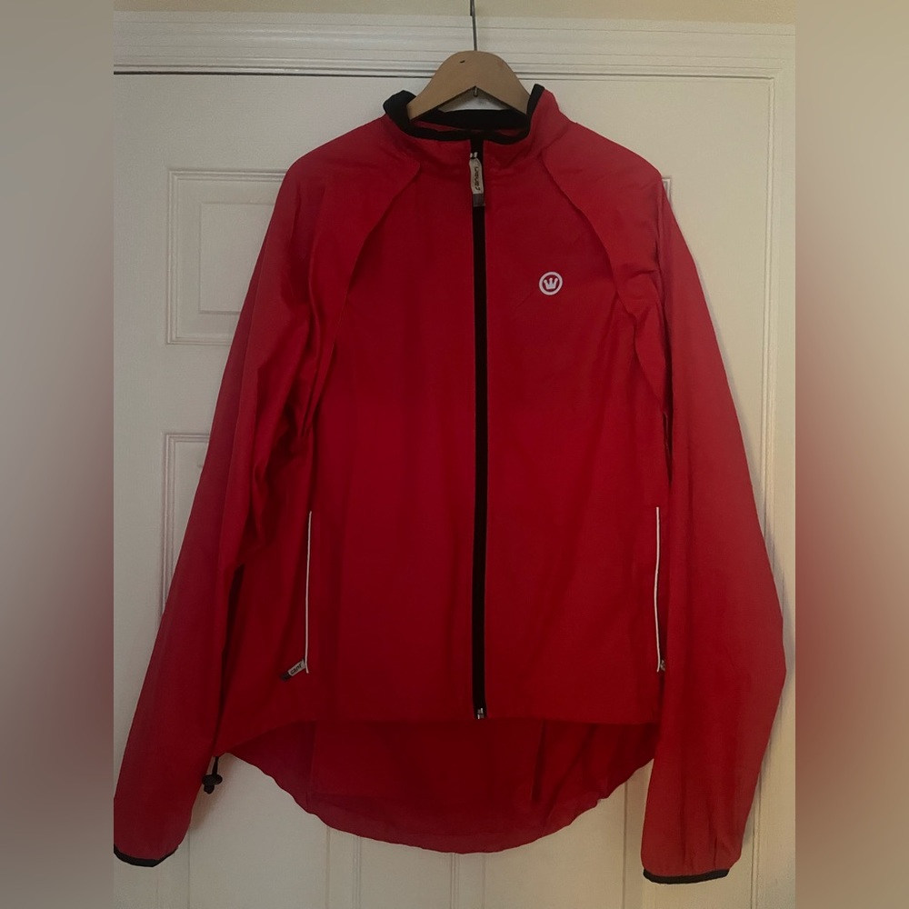 Really nice Canari lightweight cycling jacket!  Back zipper pocket.  Size XL